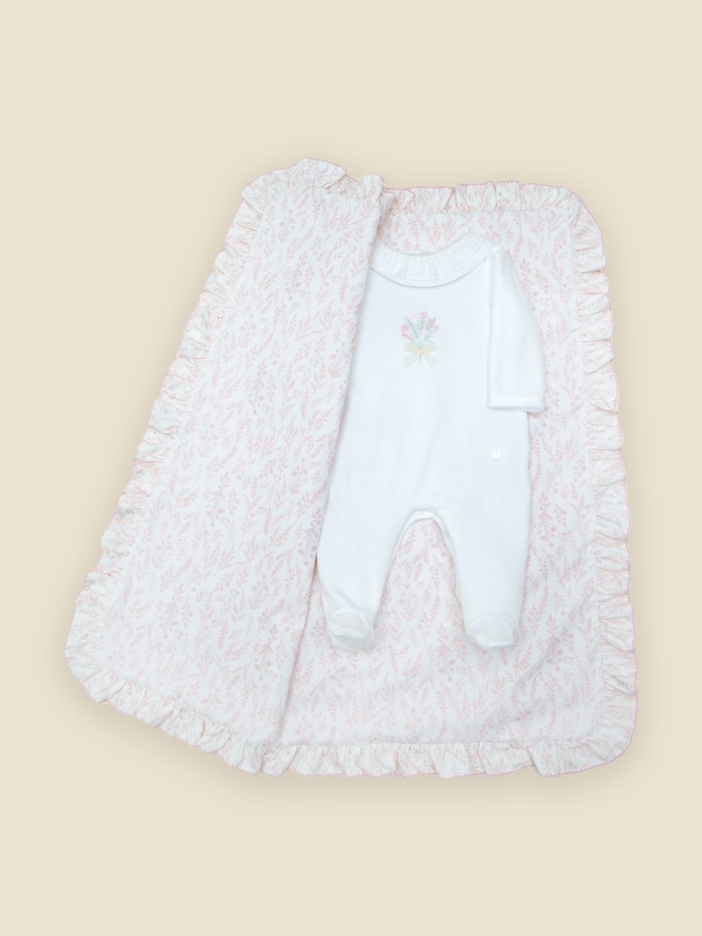 Ecru babygrow with delicate embroidery