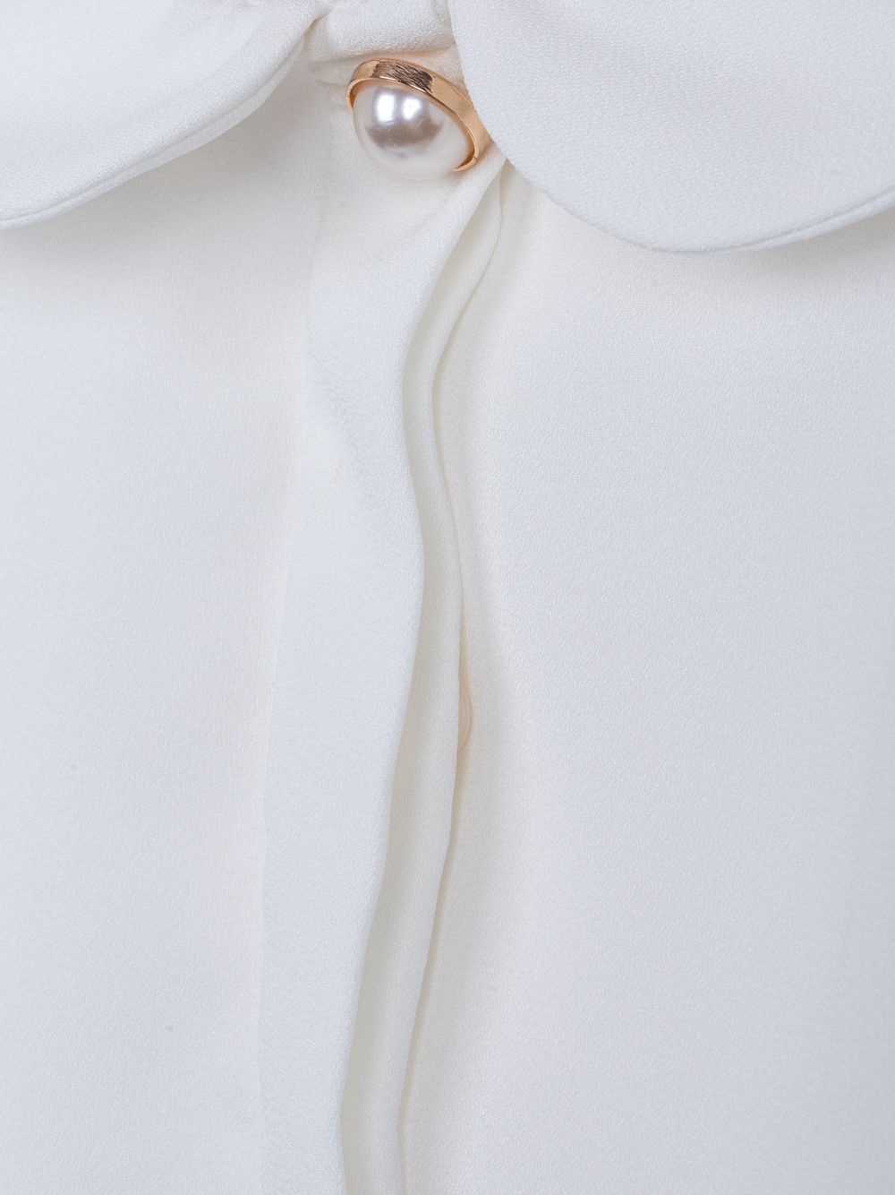 Ecru chiffon blouse with pearl buttons