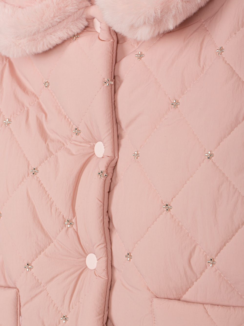 Pale pink coat with a fur collar and elegant details