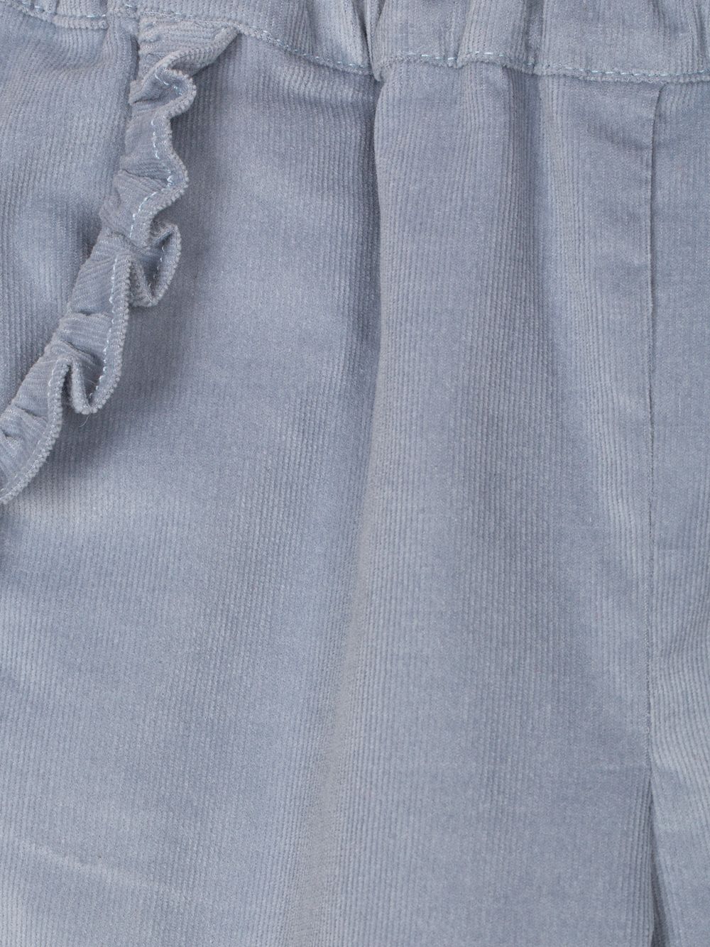 Elegant blue pants with ruffles