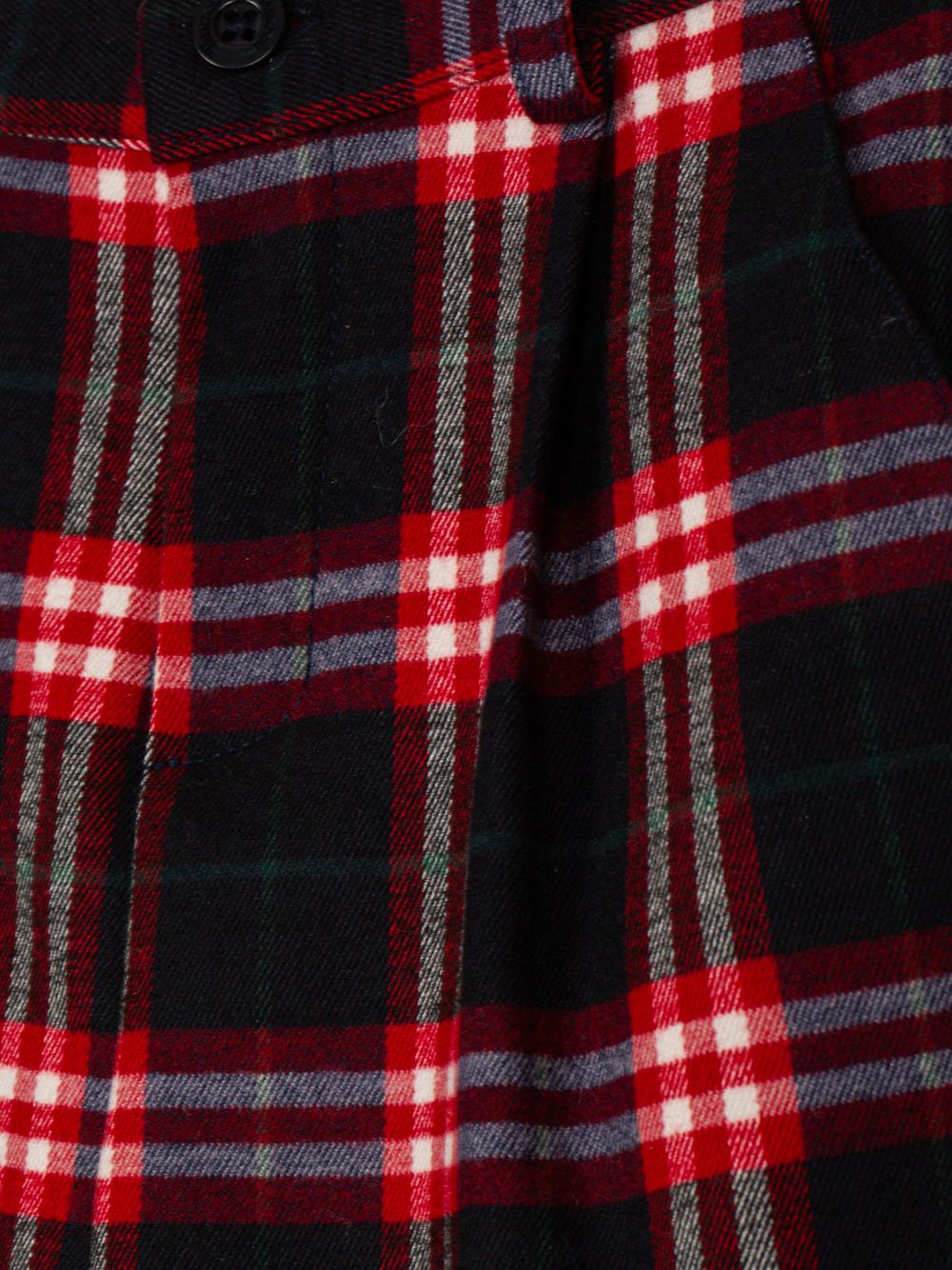 Red shorts with a tartan print